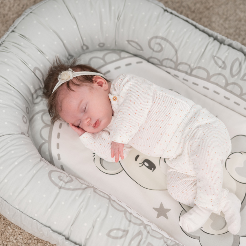 réducteur de lit bébé